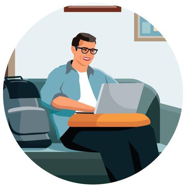 A man with glasses sitting on a couch, using a laptop to accomplish his tasks